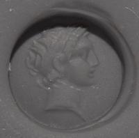 A Hellenistic Amethyst Ring Stone with the Portrait Head of a Seleucid King