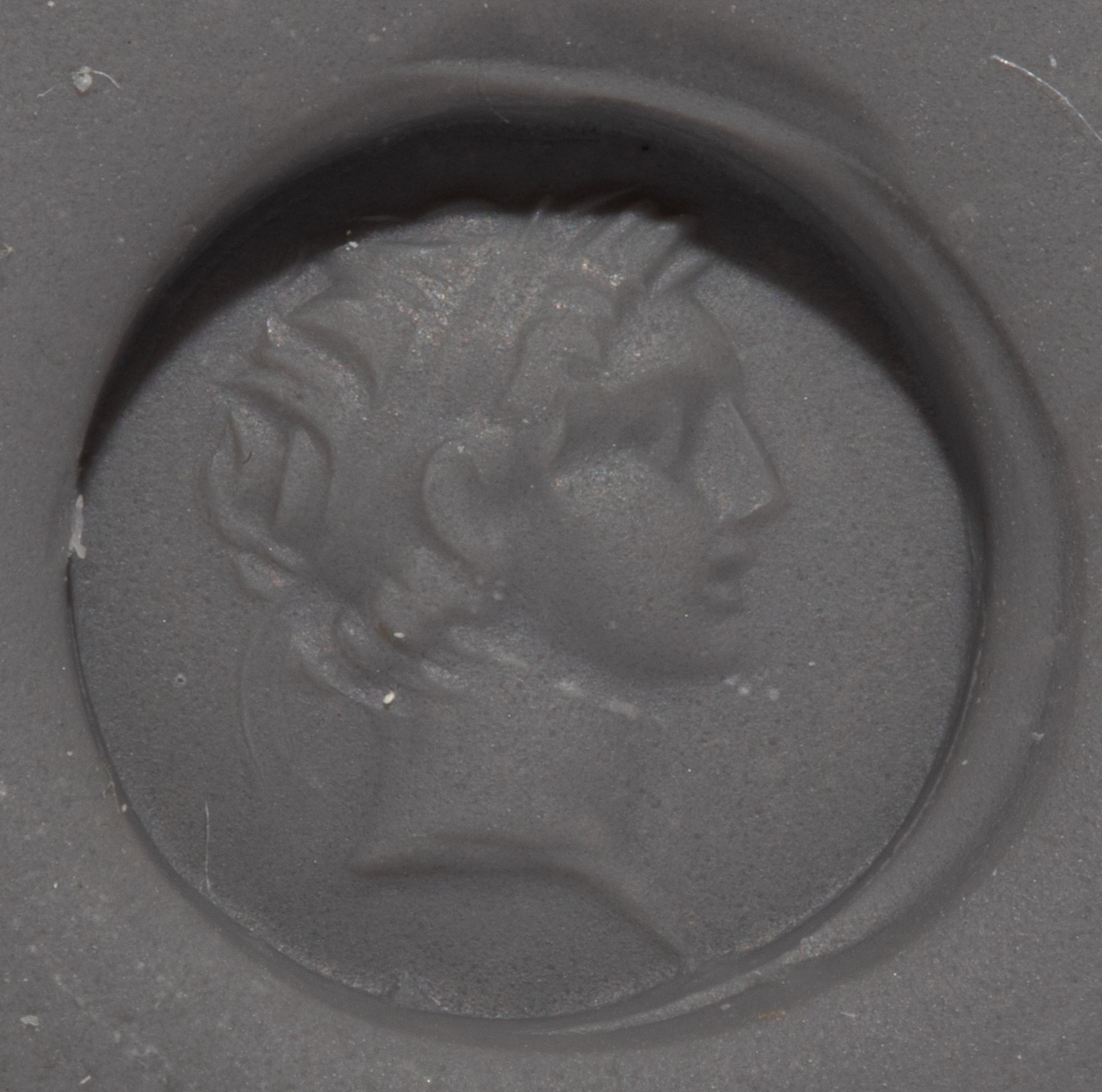 A Hellenistic Amethyst Ring Stone with the Portrait Head of a Seleucid King