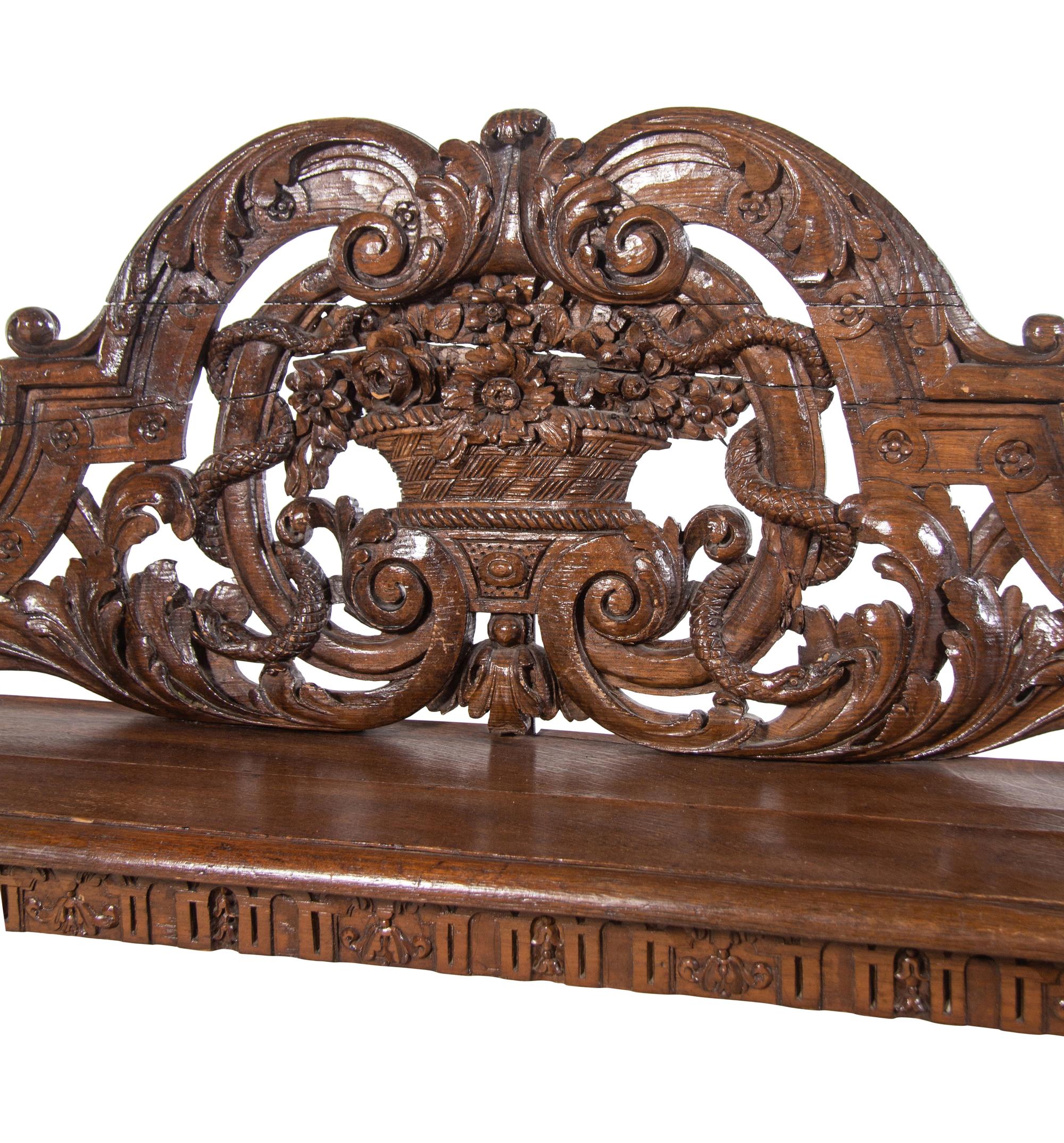 A Jacobean Style Carved Oak Hall Bench