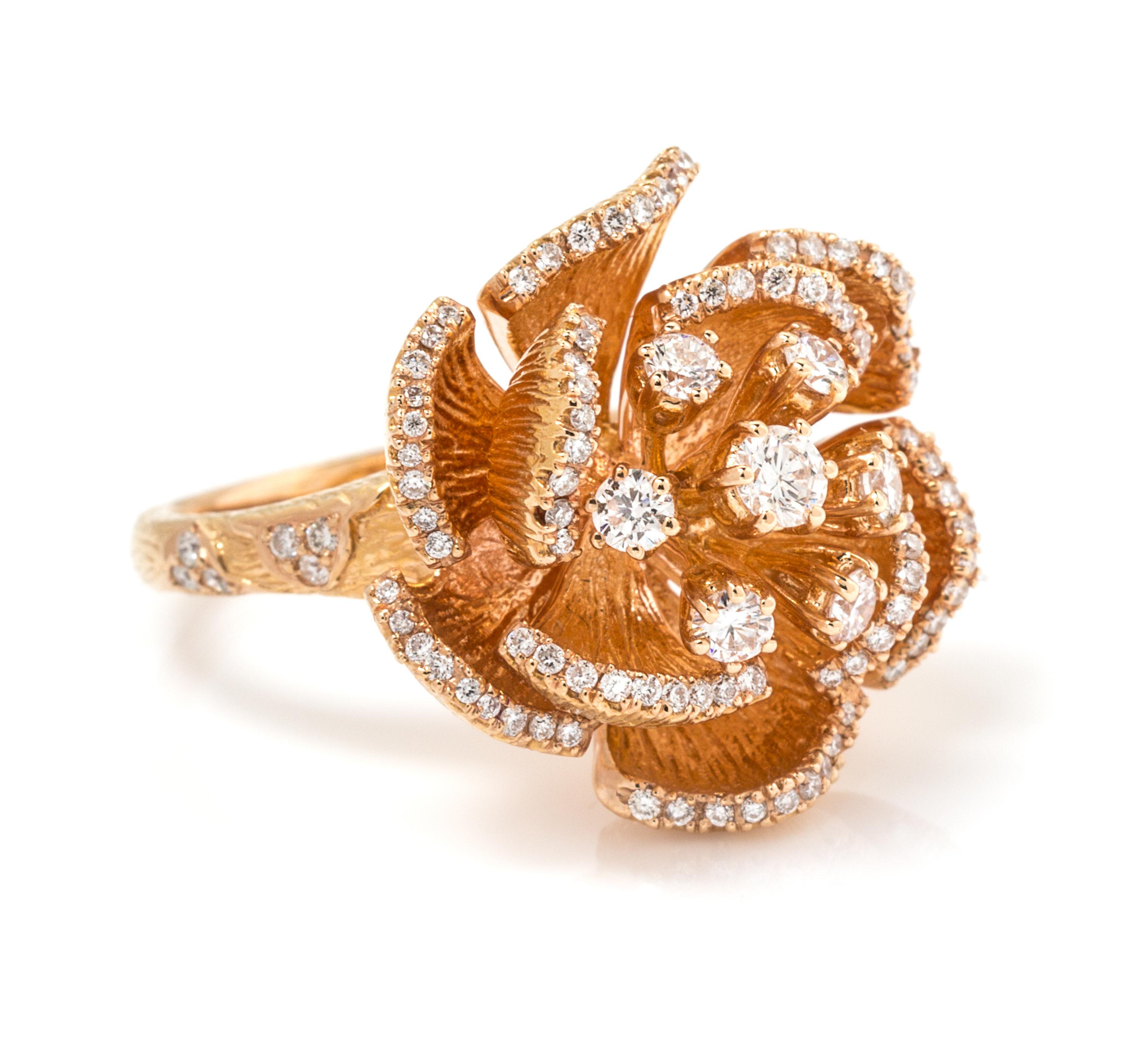 A 14 Karat Rose Gold and Diamond Flower Motif Ring, 9.50 dwts.