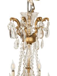An Empire Style Gilt Metal Eight-Light Chandelier