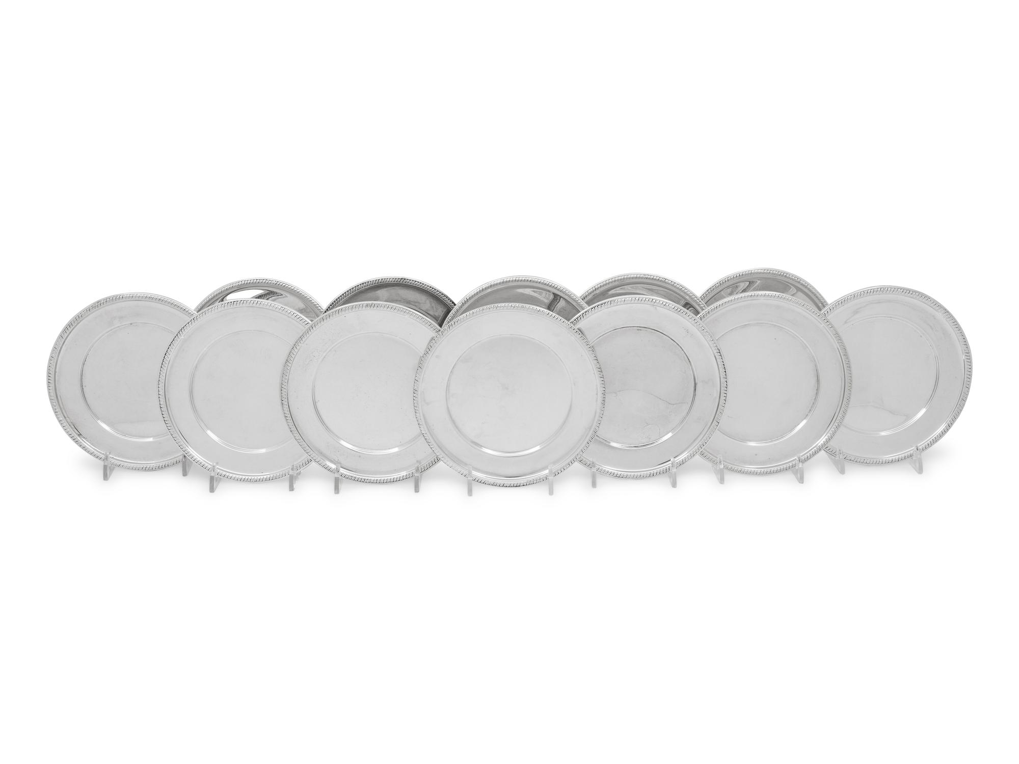 A Set of Twelve American Silver Bread Plates