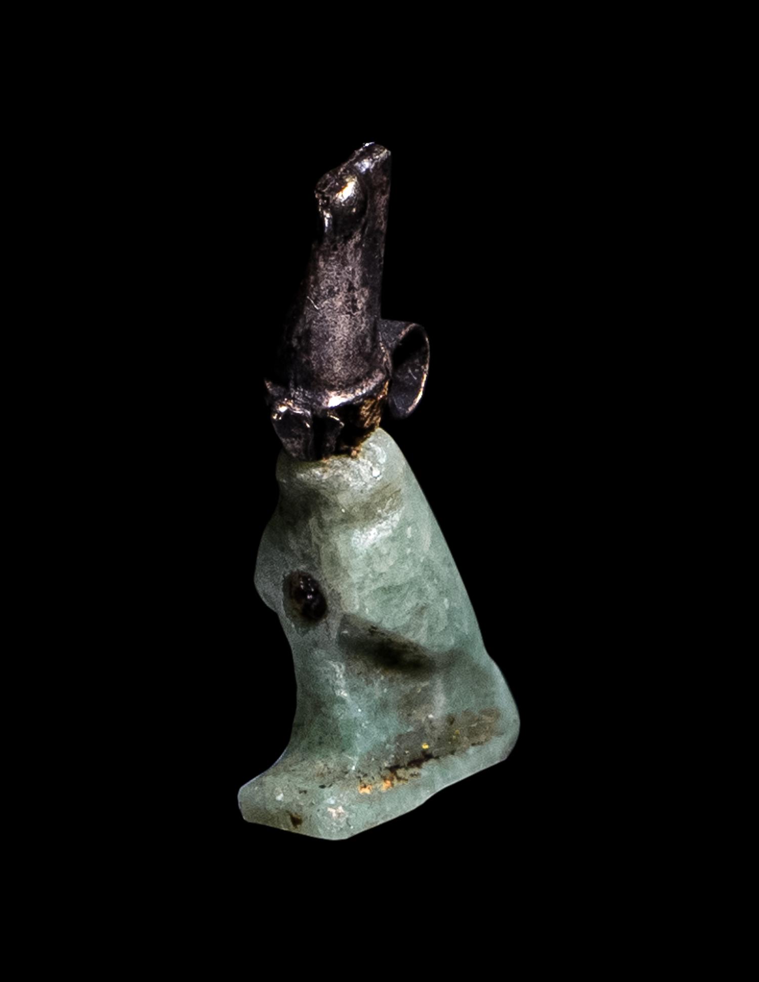 An Egyptian Feldspar and Silver Horus