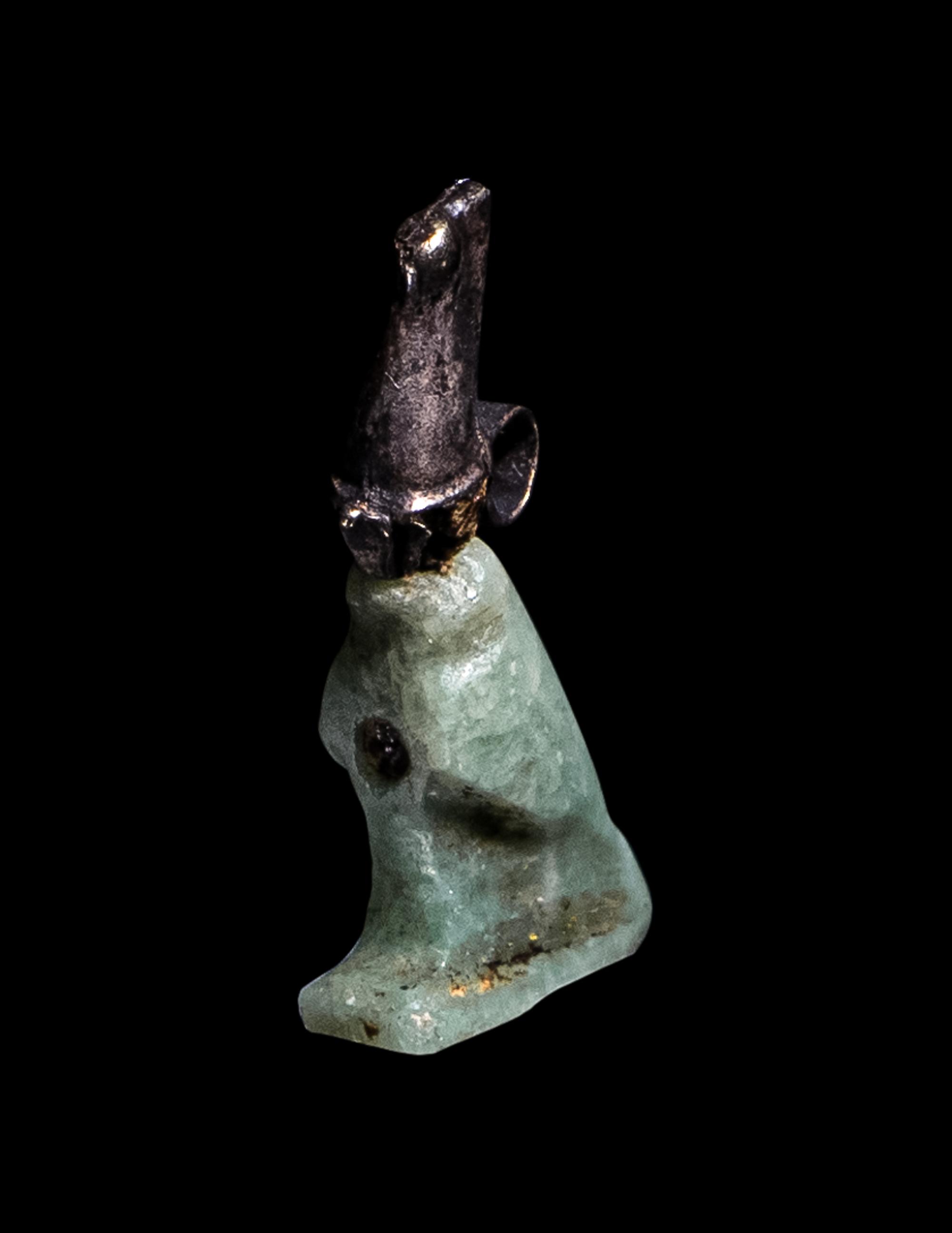 An Egyptian Feldspar and Silver Horus