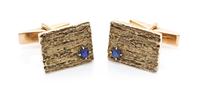A Pair of 14 Karat Yellow Gold and Synthetic Sapphire Cufflinks, 7.30 dwts.