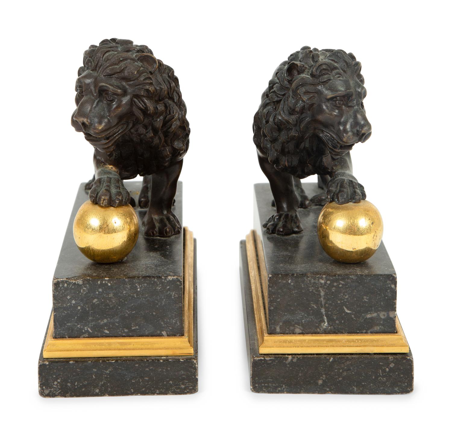 A Pair of Continental Patinated and Gilt Bronze Medici Lions