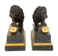 A Pair of Continental Patinated and Gilt Bronze Medici Lions