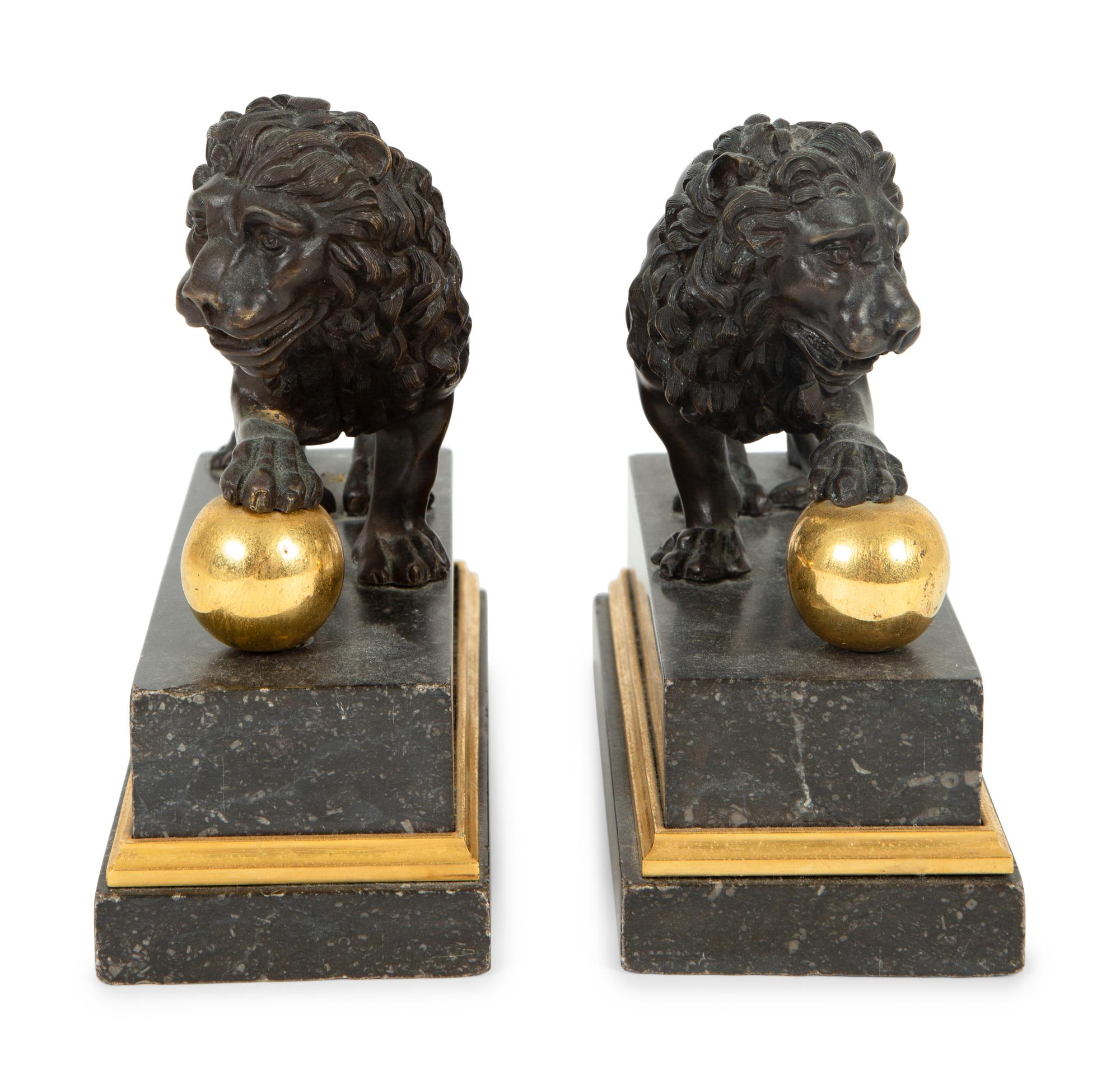 A Pair of Continental Patinated and Gilt Bronze Medici Lions