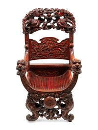 A Chinese Export Carved Hardwood Armchair