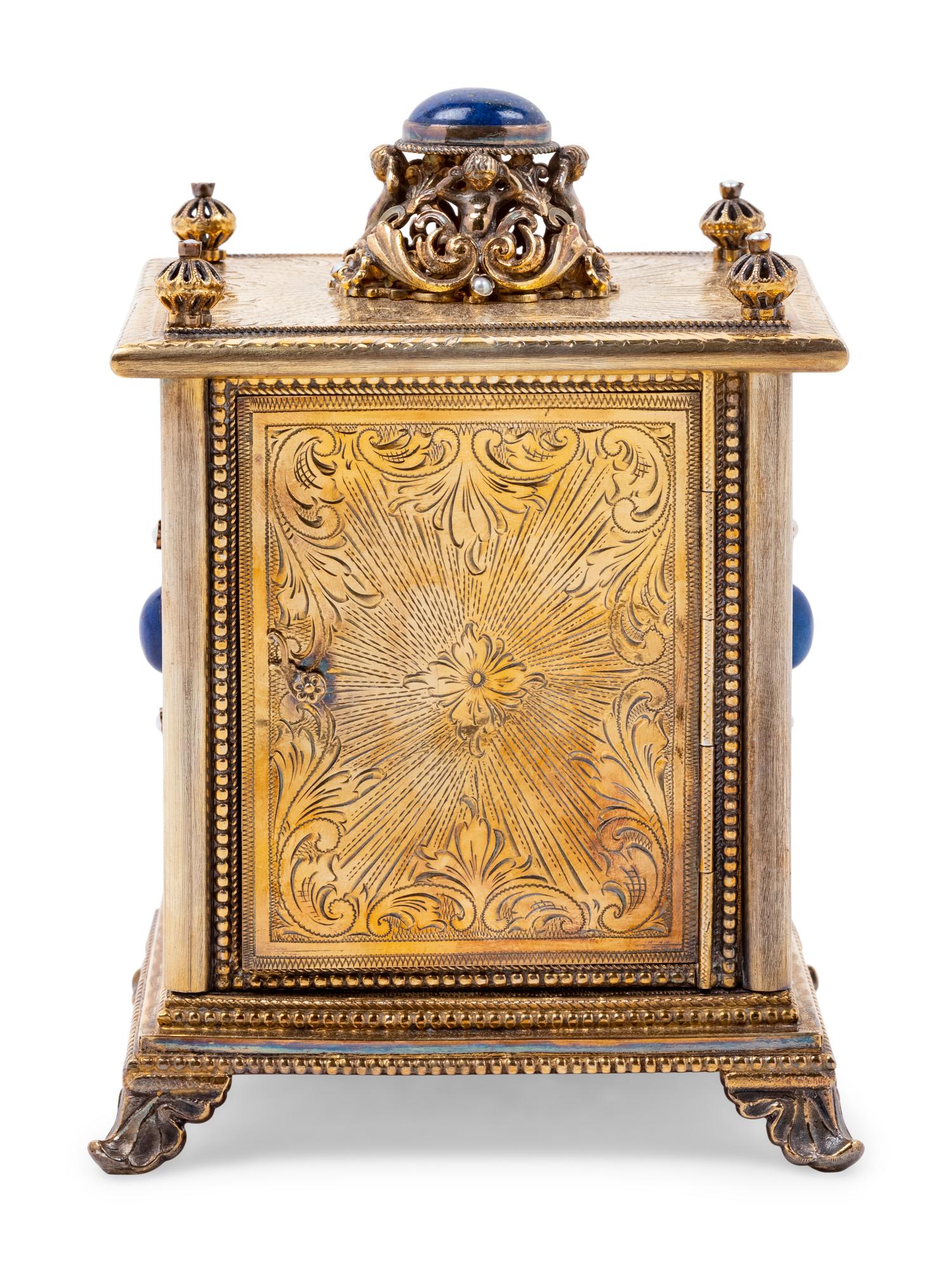 A Continental Blue Hardstone and Cultured Pearl Inset Gilt Metal and Enameled Table Clock