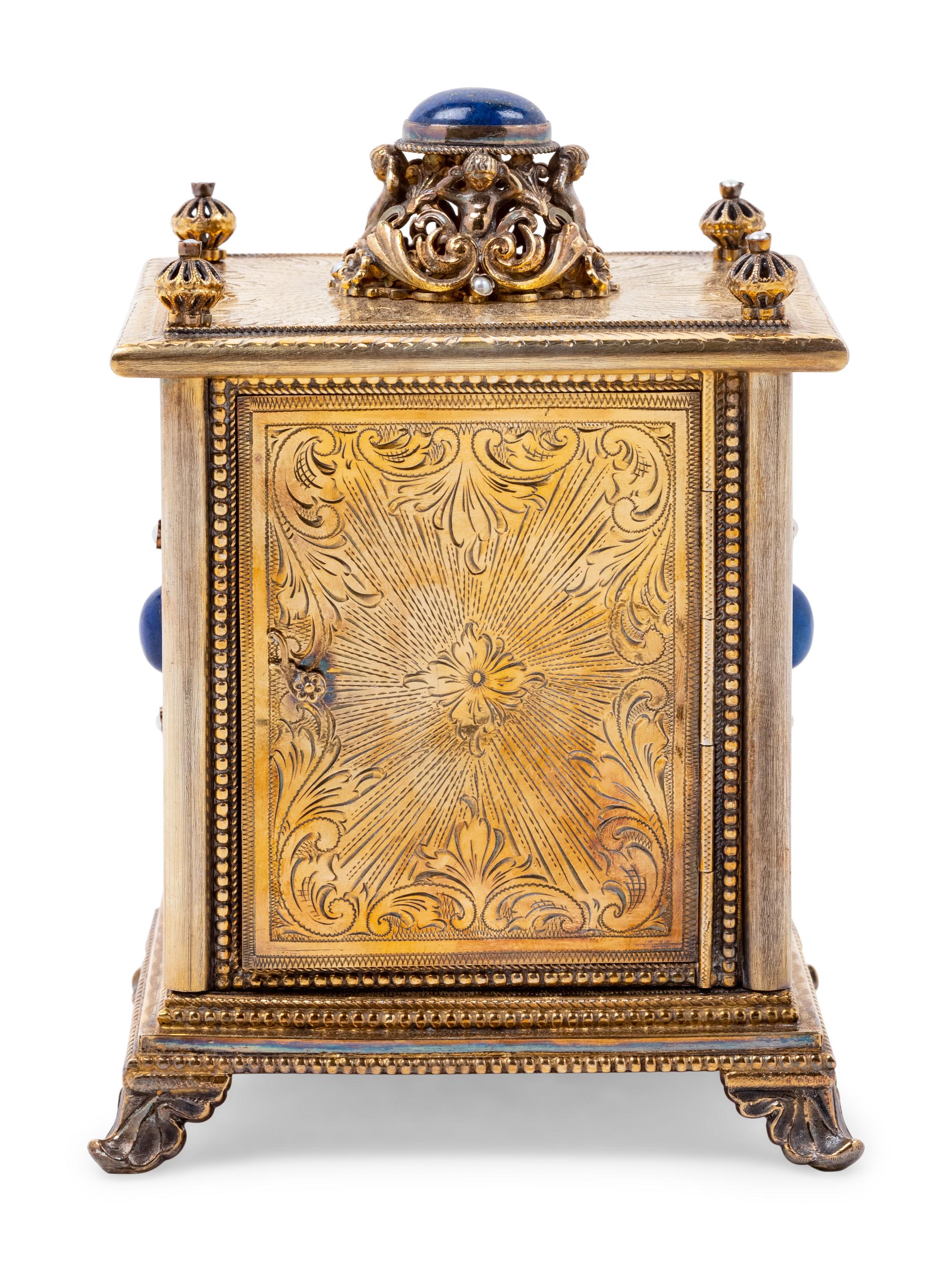 A Continental Blue Hardstone and Cultured Pearl Inset Gilt Metal and Enameled Table Clock