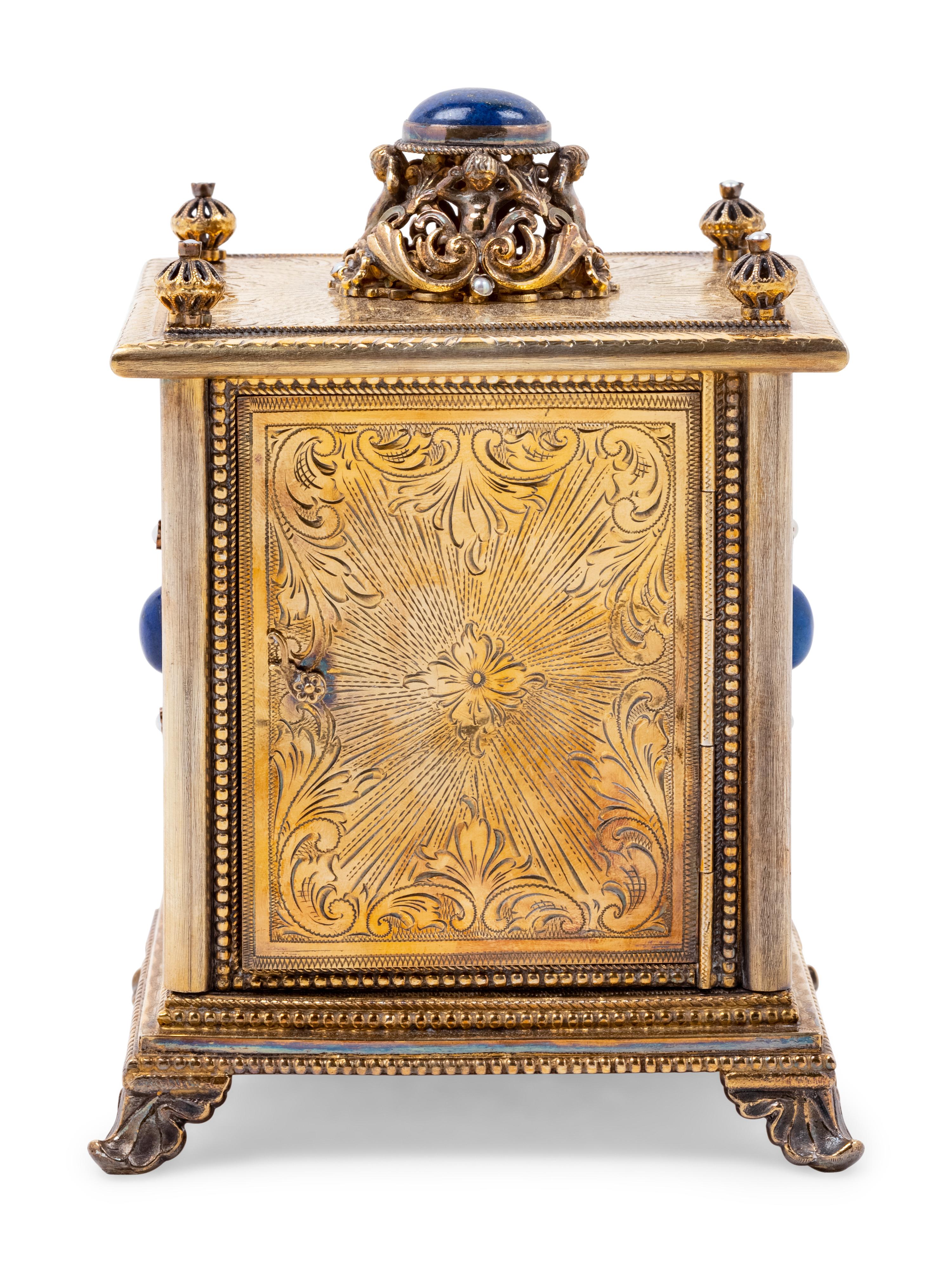 A Continental Blue Hardstone and Cultured Pearl Inset Gilt Metal and Enameled Table Clock