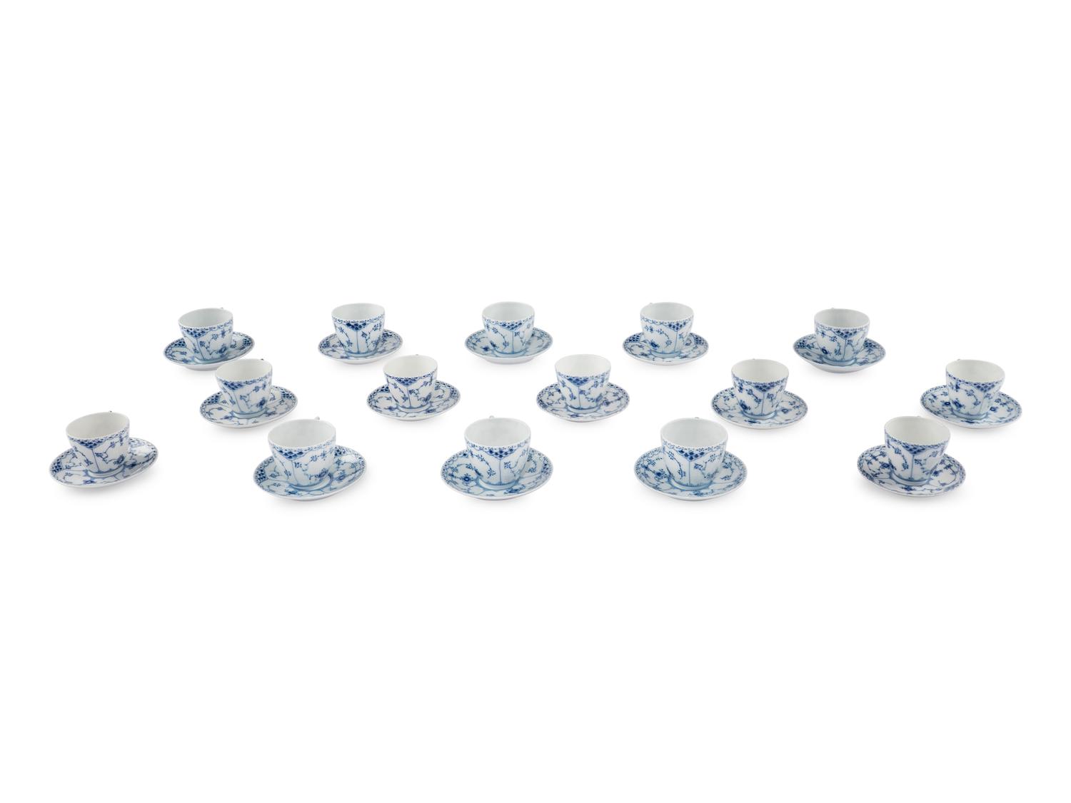 A Group of Royal Copenhagen Blue Fluted Teacups and Saucers