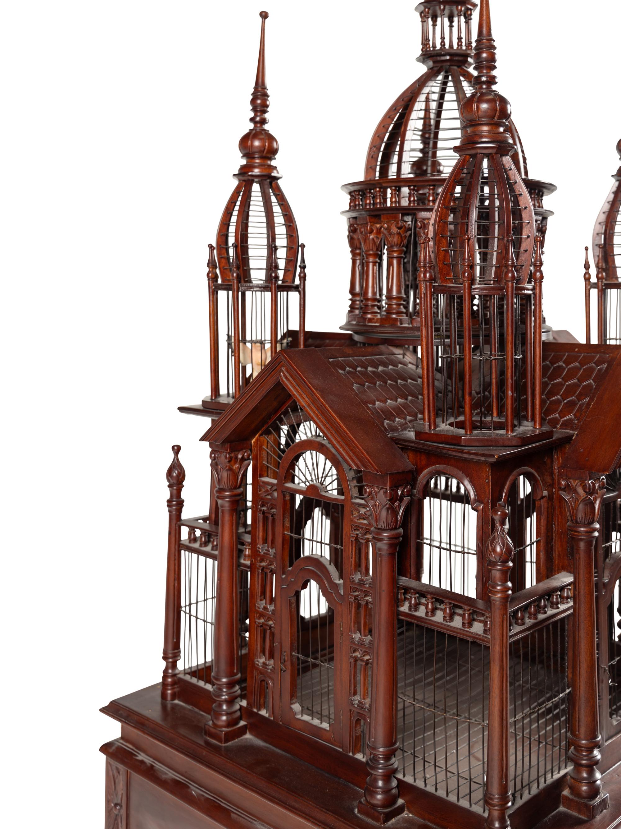 A Continental Mahogany Birdcage on Stand