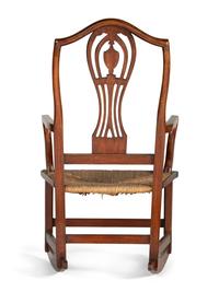 A Federal Heart and Urn Carved Mahogany Rush-Seat Rocking Chair