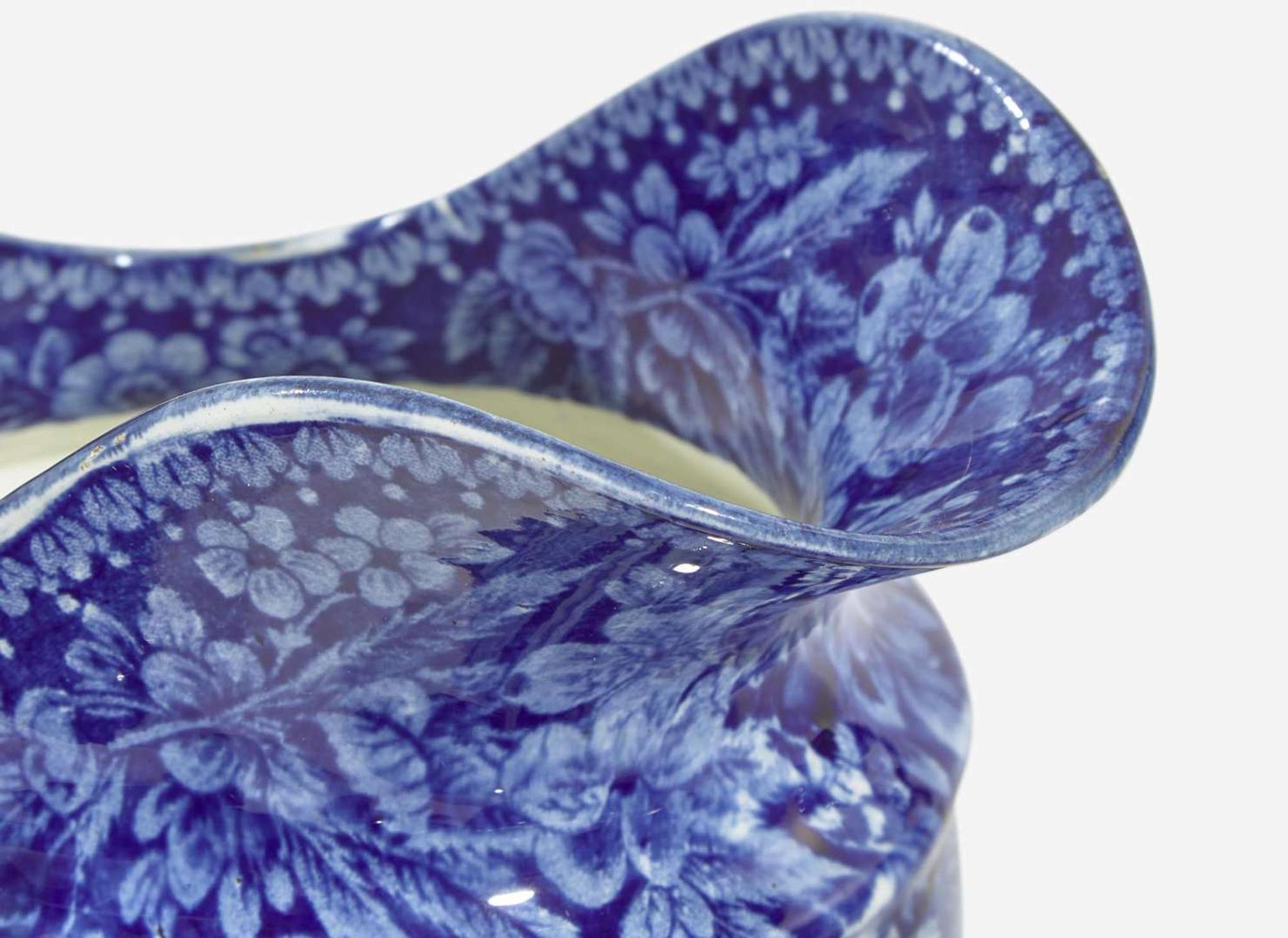 A group of thirteen "Lafayette at the Tomb of Franklin" Staffordshire Historical Blue tablewares; England, first third 19th century