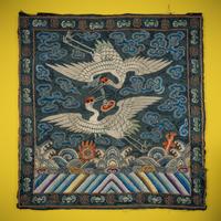 A Pair of Korean Embroidered Silk 'Double Crane' Rank Badges and a Vietnamese Salmon Pink Ground Embroidered Silk 'Crane' Rank Badge, Late 19th Century — 十九世紀晚期 朝鮮王朝文官鶴紋補子一對及越南鶴紋補子
