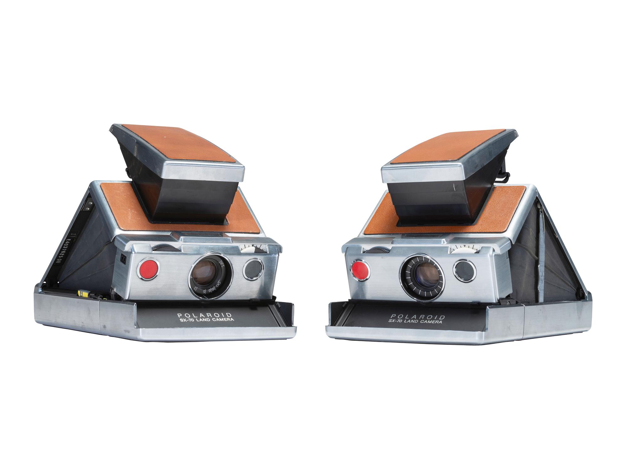 [CAMERAS]. 3 Polaroid cameras, incl. SX70 and Model 95 outfit with accessories.