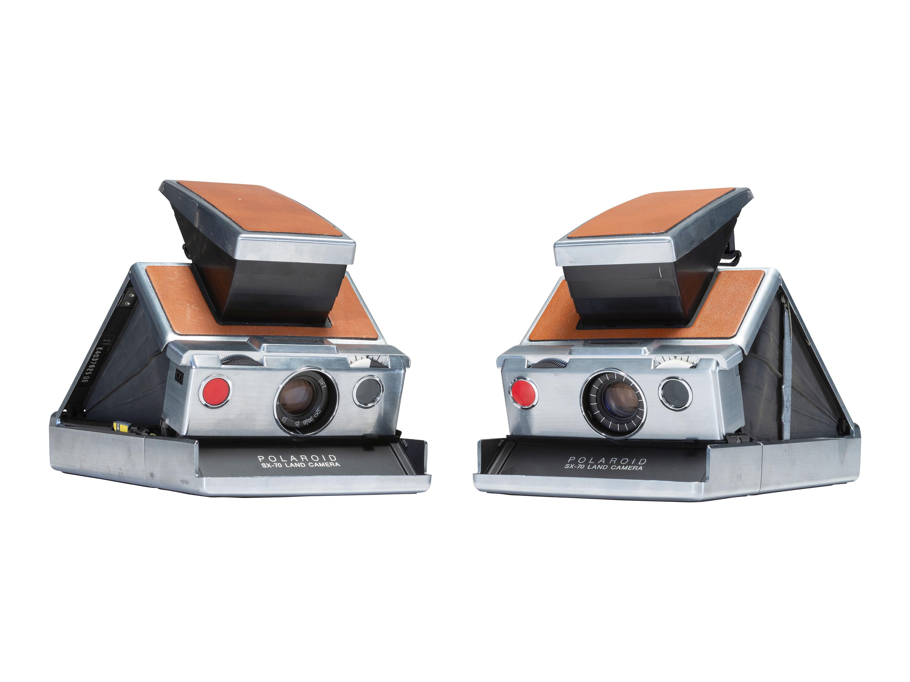 [CAMERAS]. 3 Polaroid cameras, incl. SX70 and Model 95 outfit with accessories.