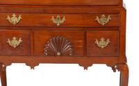 A Queen Anne Fan-Carved Cherrywood Bonnet-Top High Chest