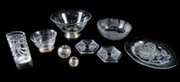 A Group of Nine Glass Table Articles