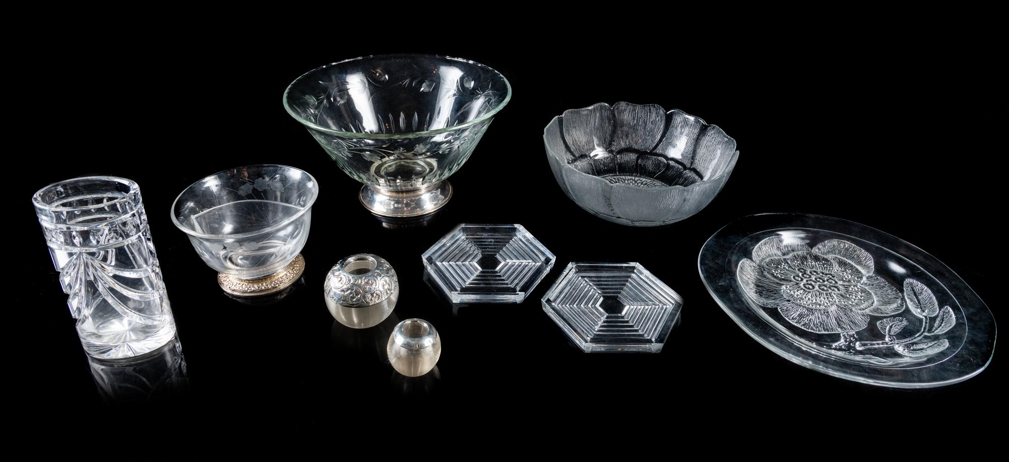 A Group of Nine Glass Table Articles