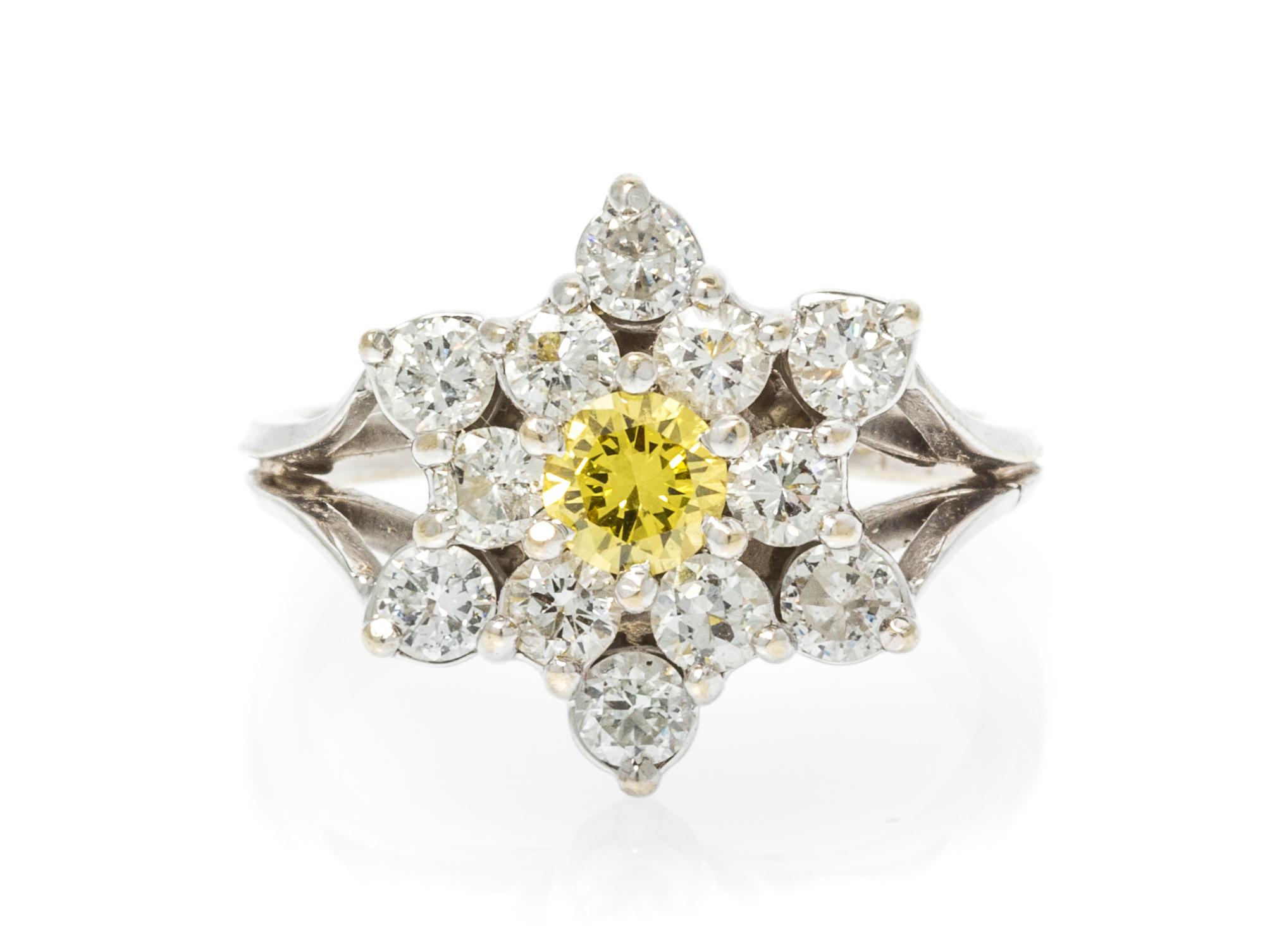 An 18 Karat White Gold, Yellow and White Cluster Diamond Ring, 3.70 dwts.