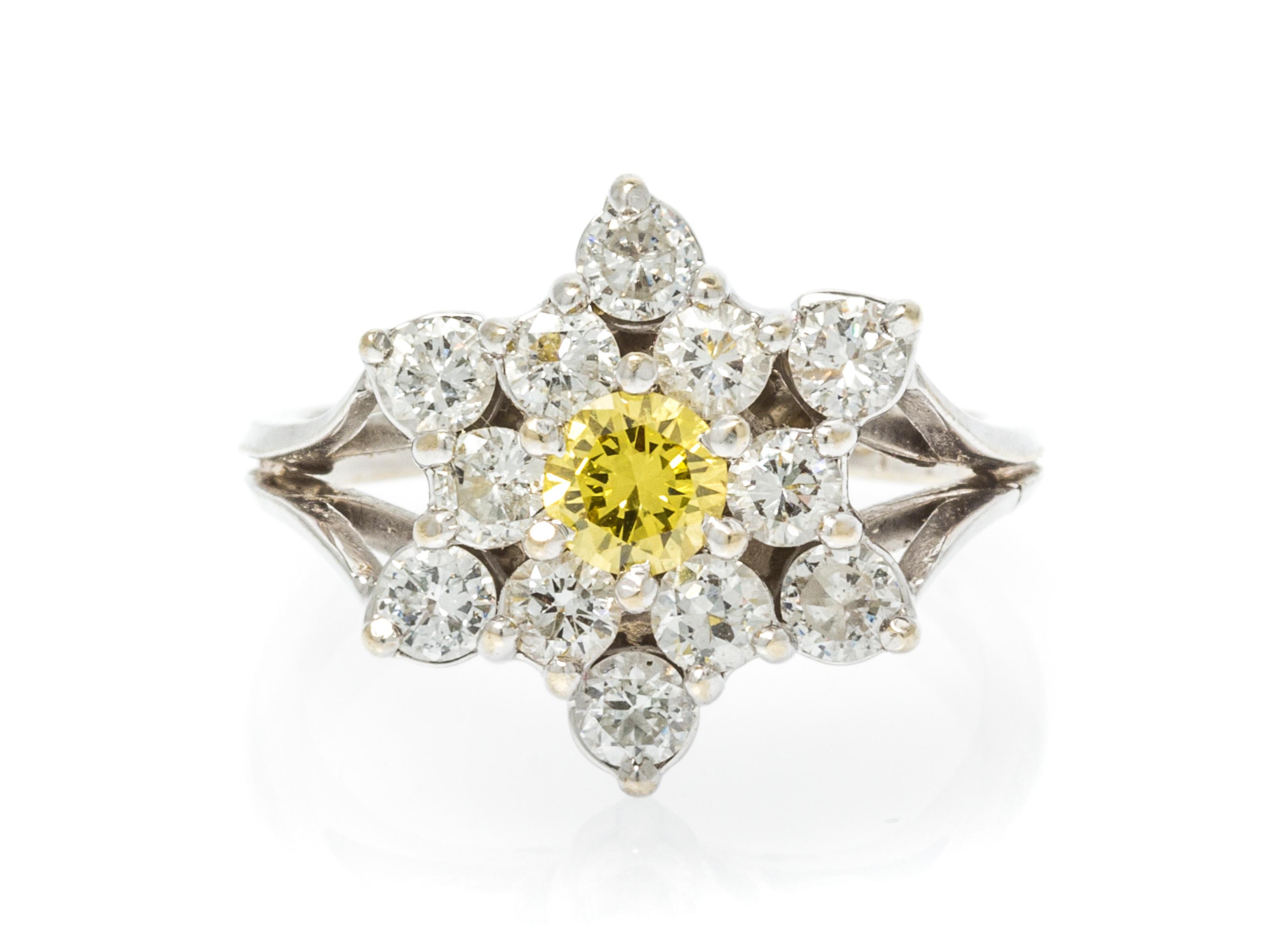 An 18 Karat White Gold, Yellow and White Cluster Diamond Ring, 3.70 dwts.