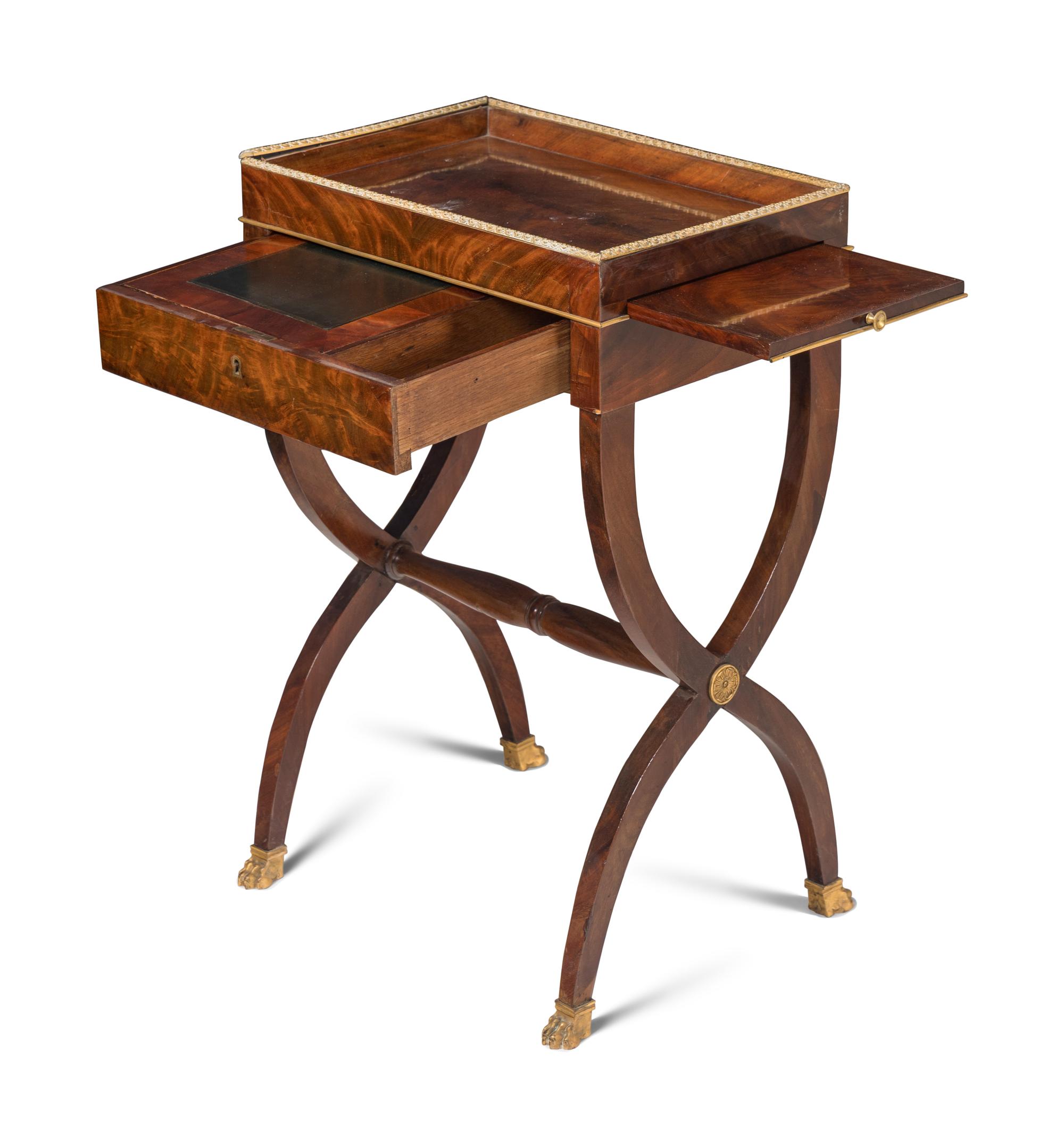 A Restauration Gilt Bronze Mounted Mahogany Writing Table