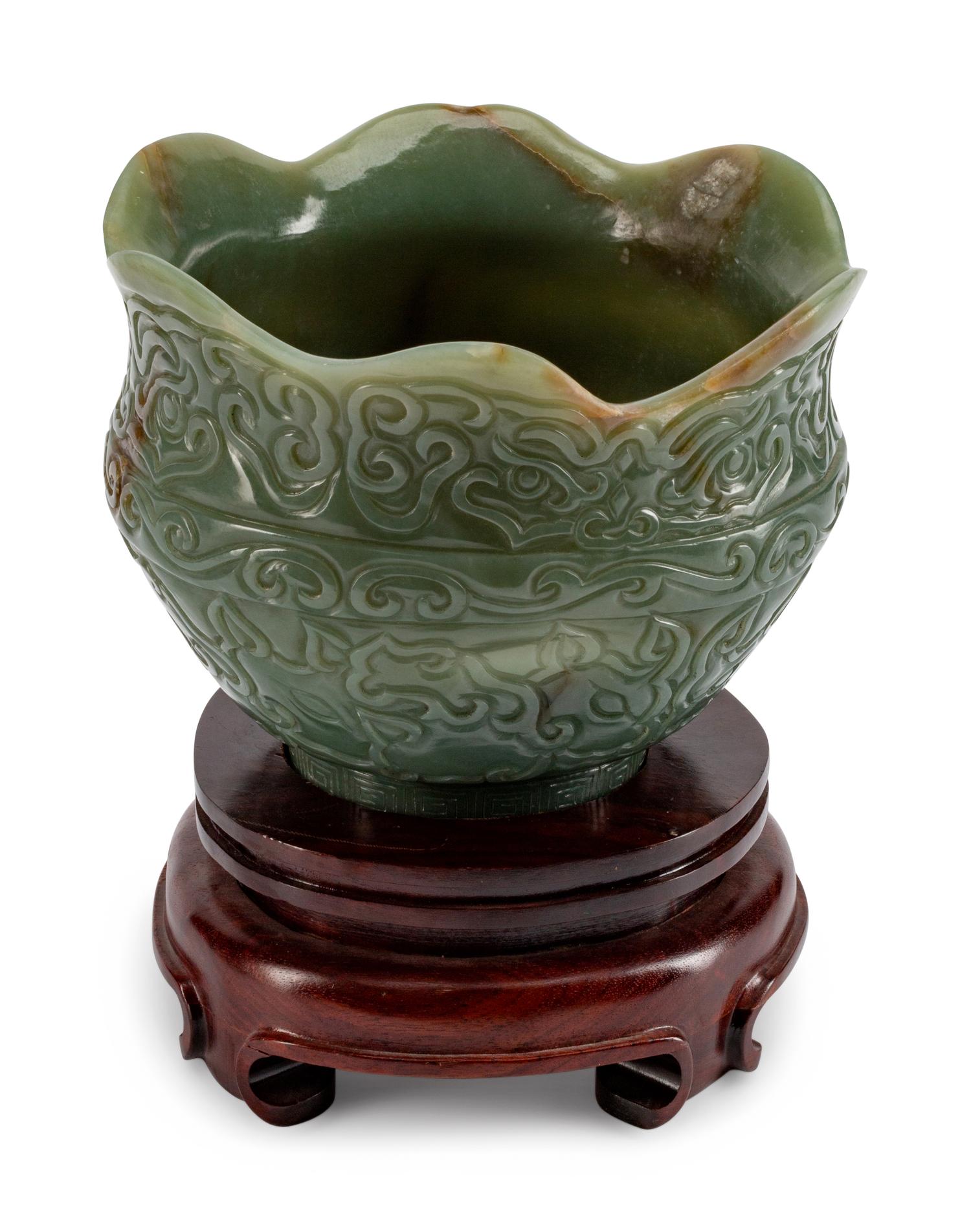 A Chinese Carved Jadeite Bowl