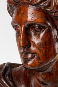 An Italian Carved Wood Bust of a Roman