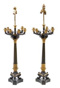 A Pair of Napoleon III Gilt and Patinated Bronze Eight-Light Candelabra, Height overall 45 1/2 inches.