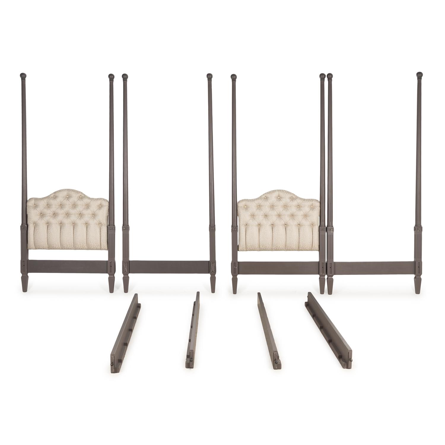 A Pair of Gray-Painted and Upholstered Twin Poster Beds