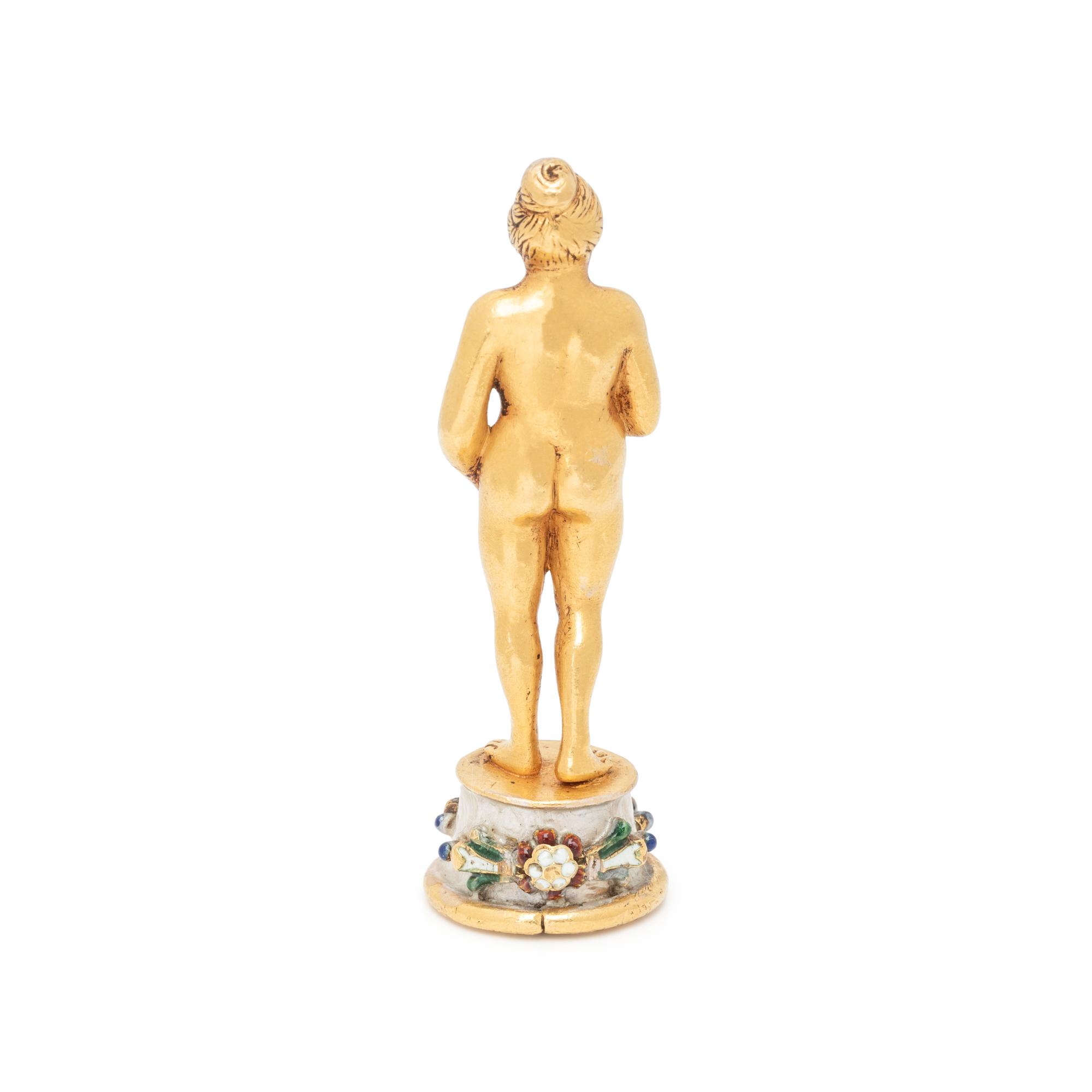 SCULPTURAL FIGURINE