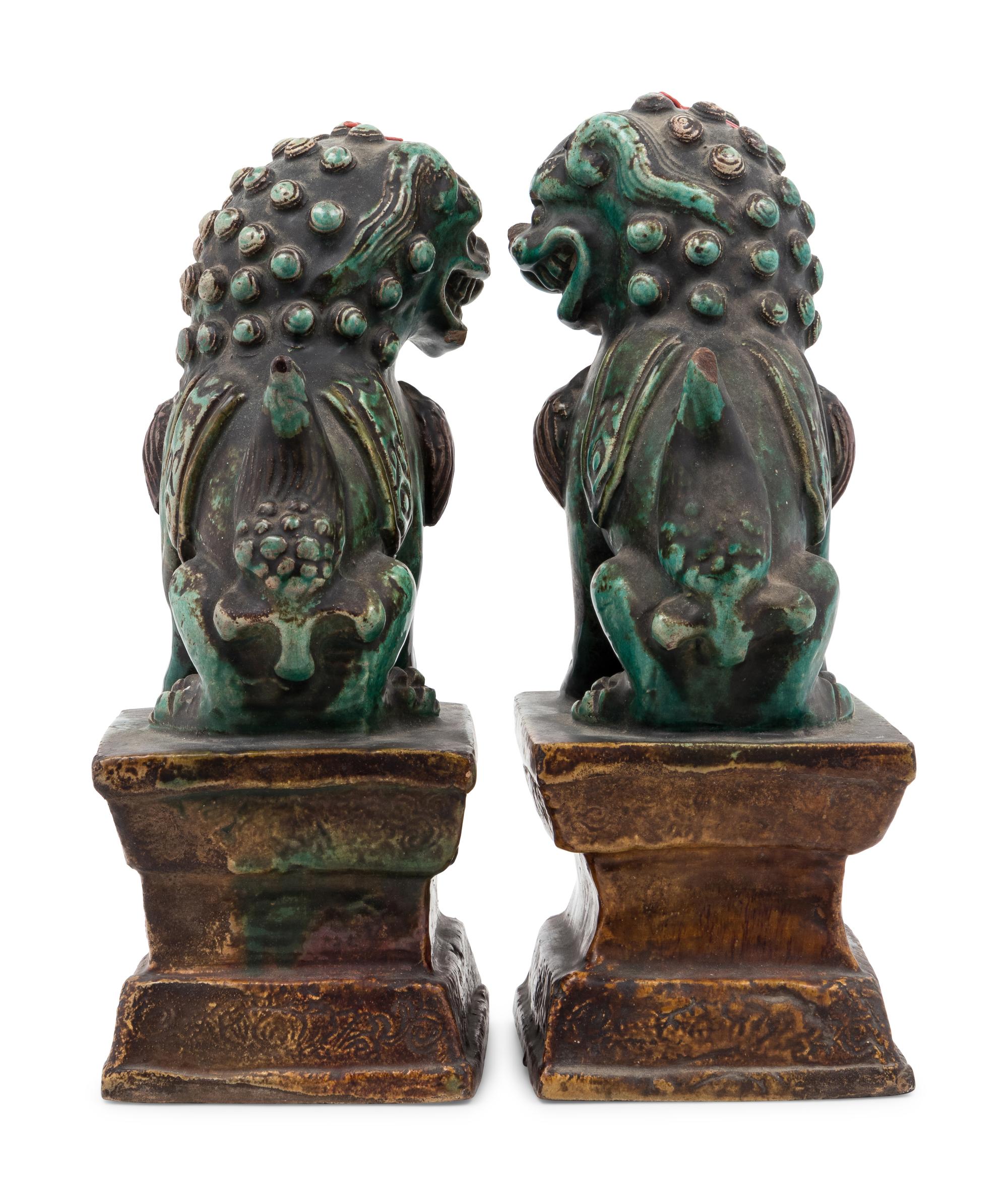 A Pair of Chinese Glazed Pottery Temple Guardians