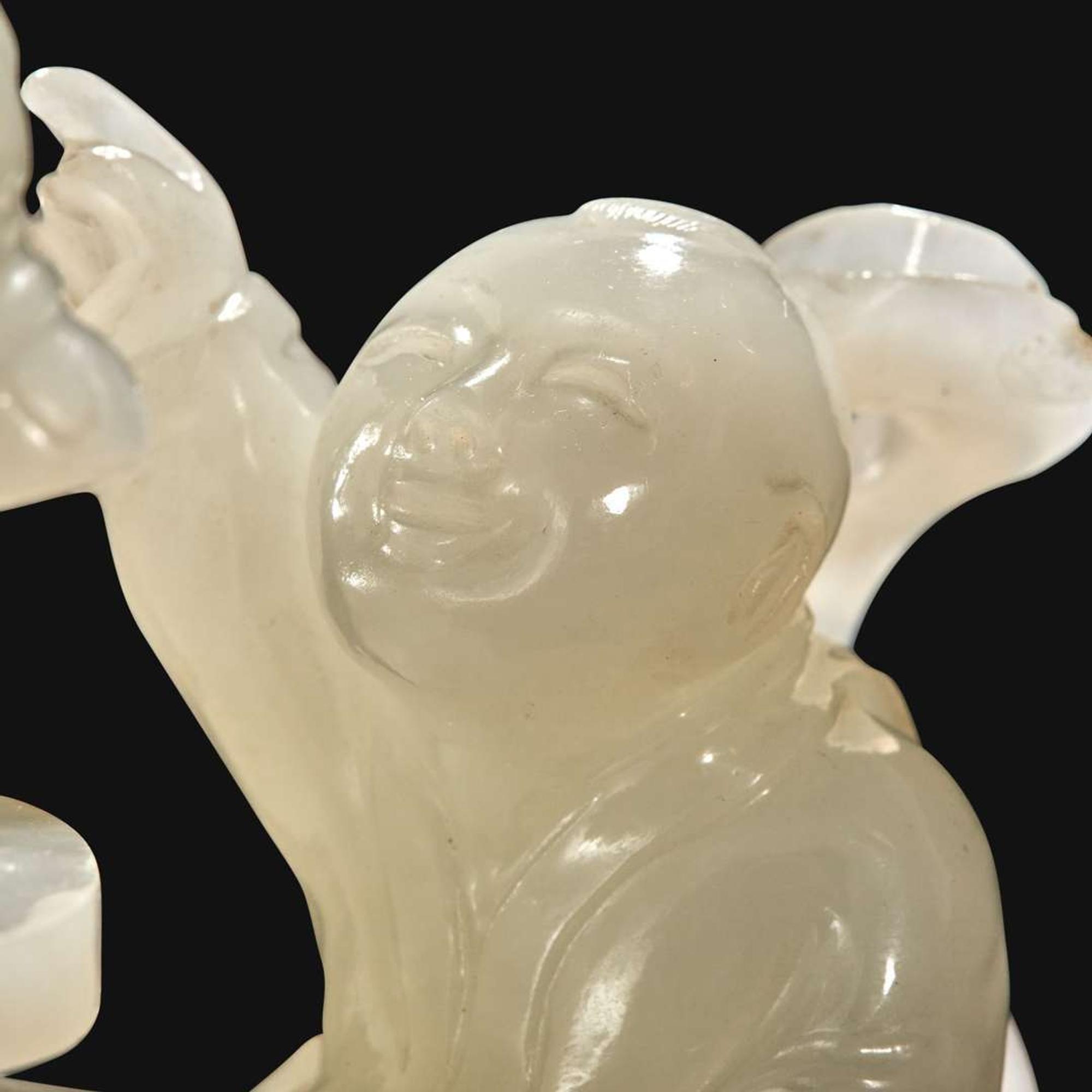 A Chinese carved white jade "Boys" vase and cover Qing Dynasty, 18th/early 19th Century