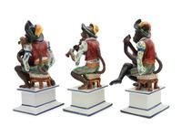 A Set of Three Italian Majolica Monkey Band Figures