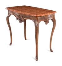 A Régence Carved Walnut Marble-Top Center Table