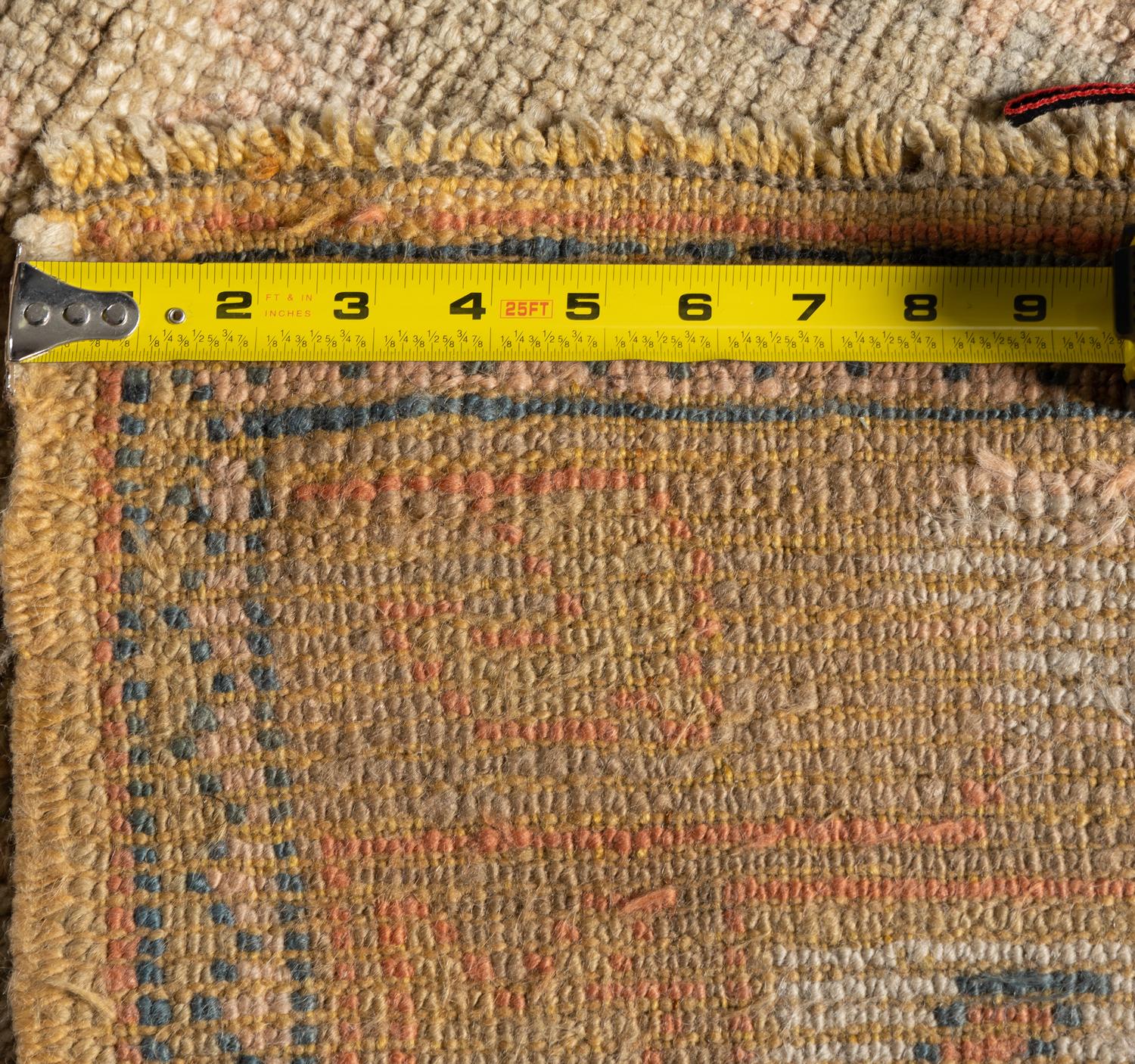 An Oushak Wool Rug