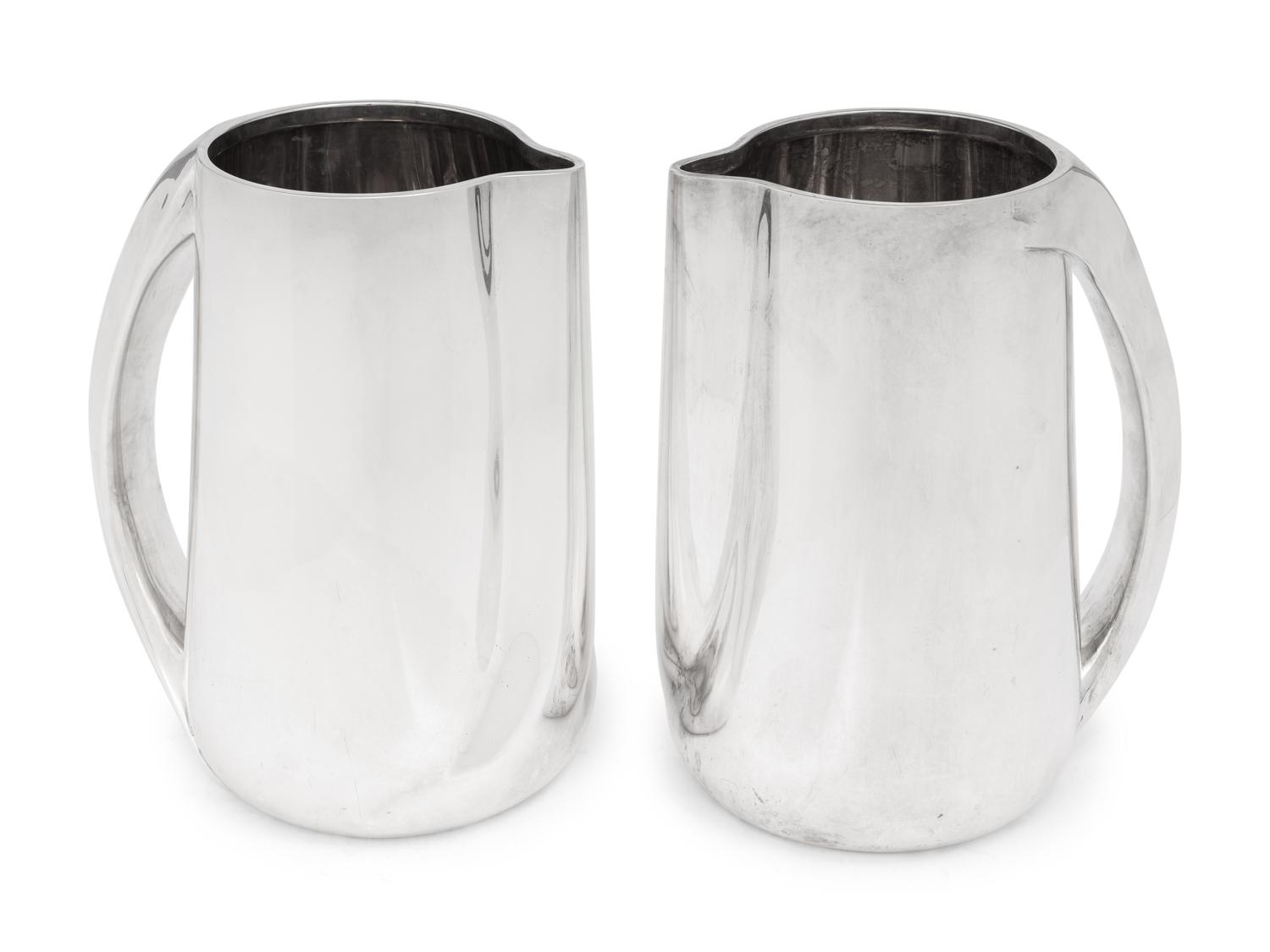 A Pair of Elsa Peretti for Tiffany and Co. Italian Silver Pitchers