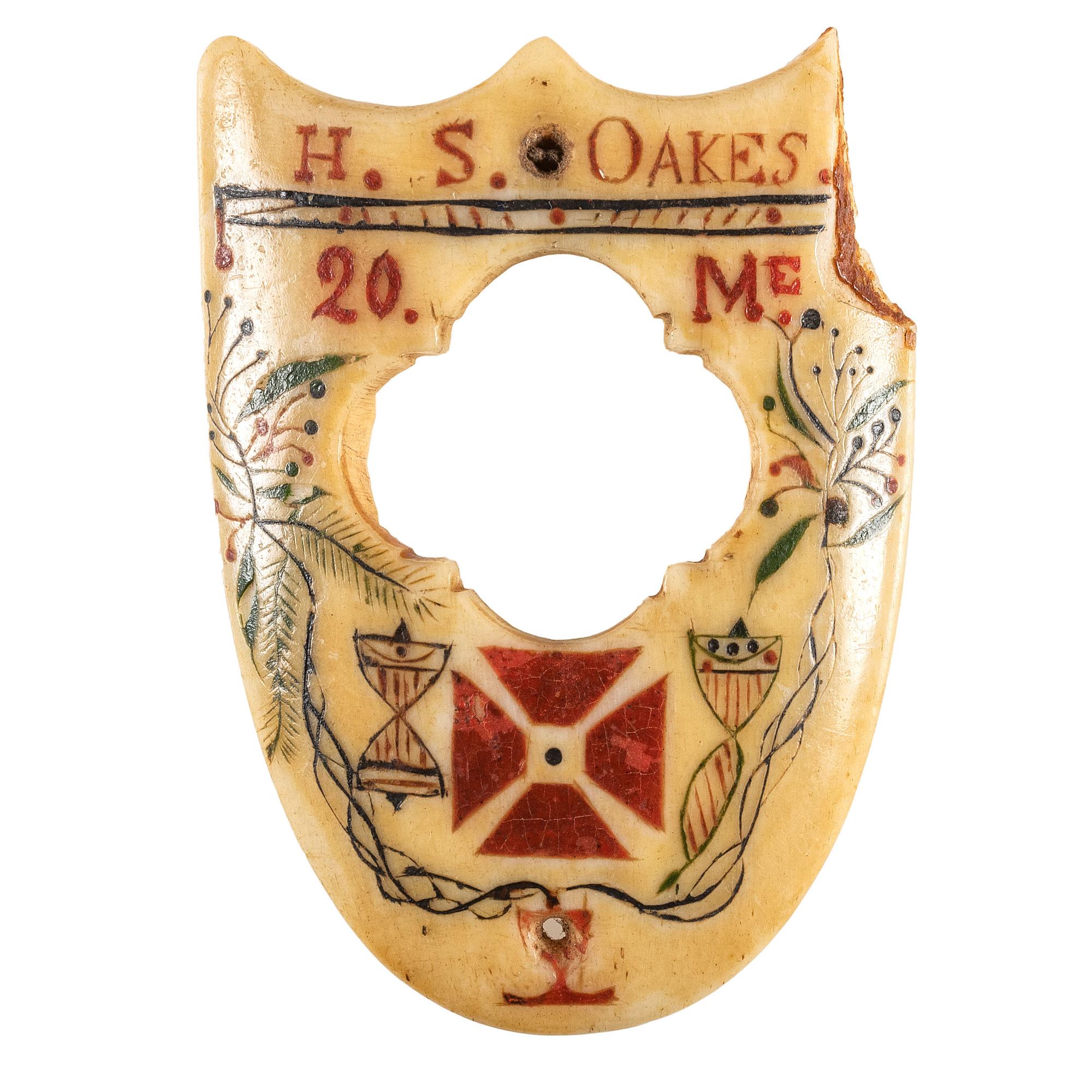 Civil War soldier's folk art shield brooch "made from a Rebel bone" by Private Hudson S. Oakes, Company B, 20th Maine Infantry.