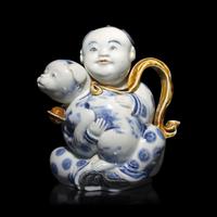A Japanese Hirado Porcelain 'Boy and Puppy' Ewer, 19th Century — 日本江戶-明治時期 平戶燒抱犬童子執壺