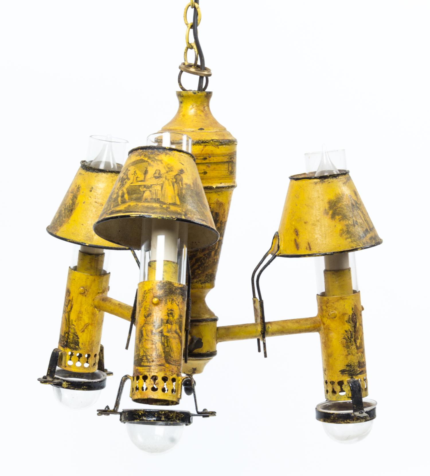 A Tole Painted Three Light Chandelier Height 11 1/4 x width 12 inches.