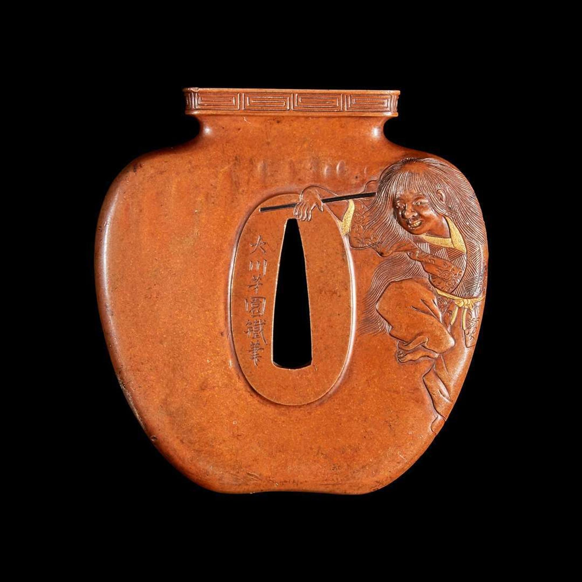 A Japanese patinated and parcel-gilt metal "Shojo and Wine Jar" Tsuba 日本”猩猩与酒壶“刀镡 Late Edo/Meiji period ???????