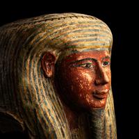 An Egyptian Polychrome Wood Mummy Mask