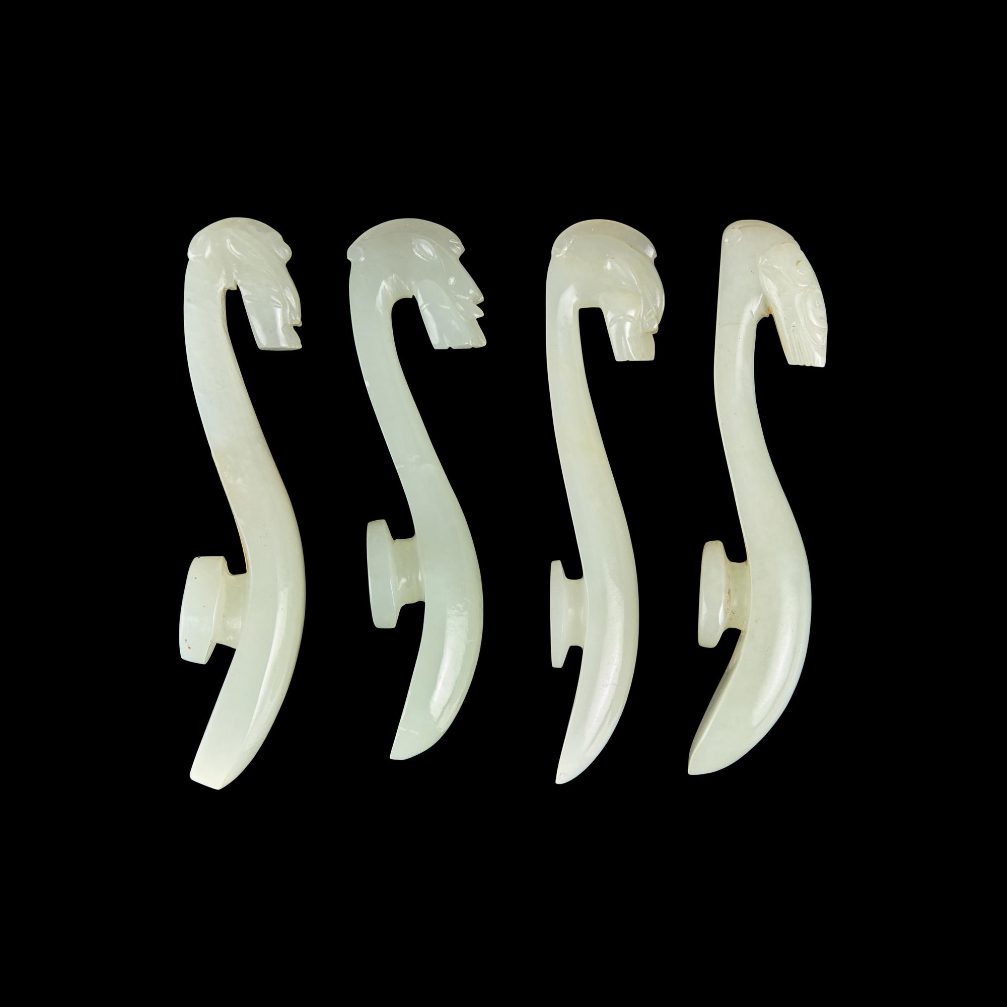 Four Chinese Pale Celadon Jade Belt Hooks, Qing Dynasty 清 青白玉帶鉤四件