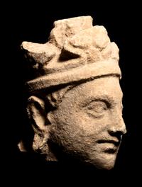 Three Gandharan Fragmentary Stucco Heads and One European Fragmentary Stucco Head