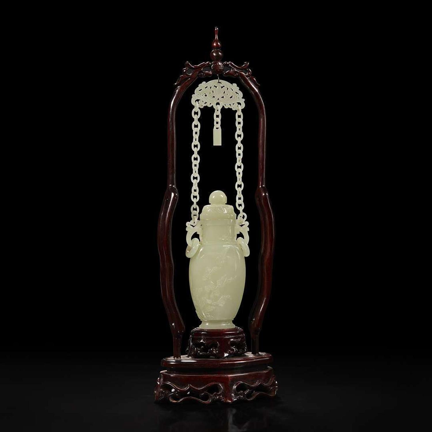 A Chinese pale celadon jade hanging vase and wood stand 白玉吊瓶