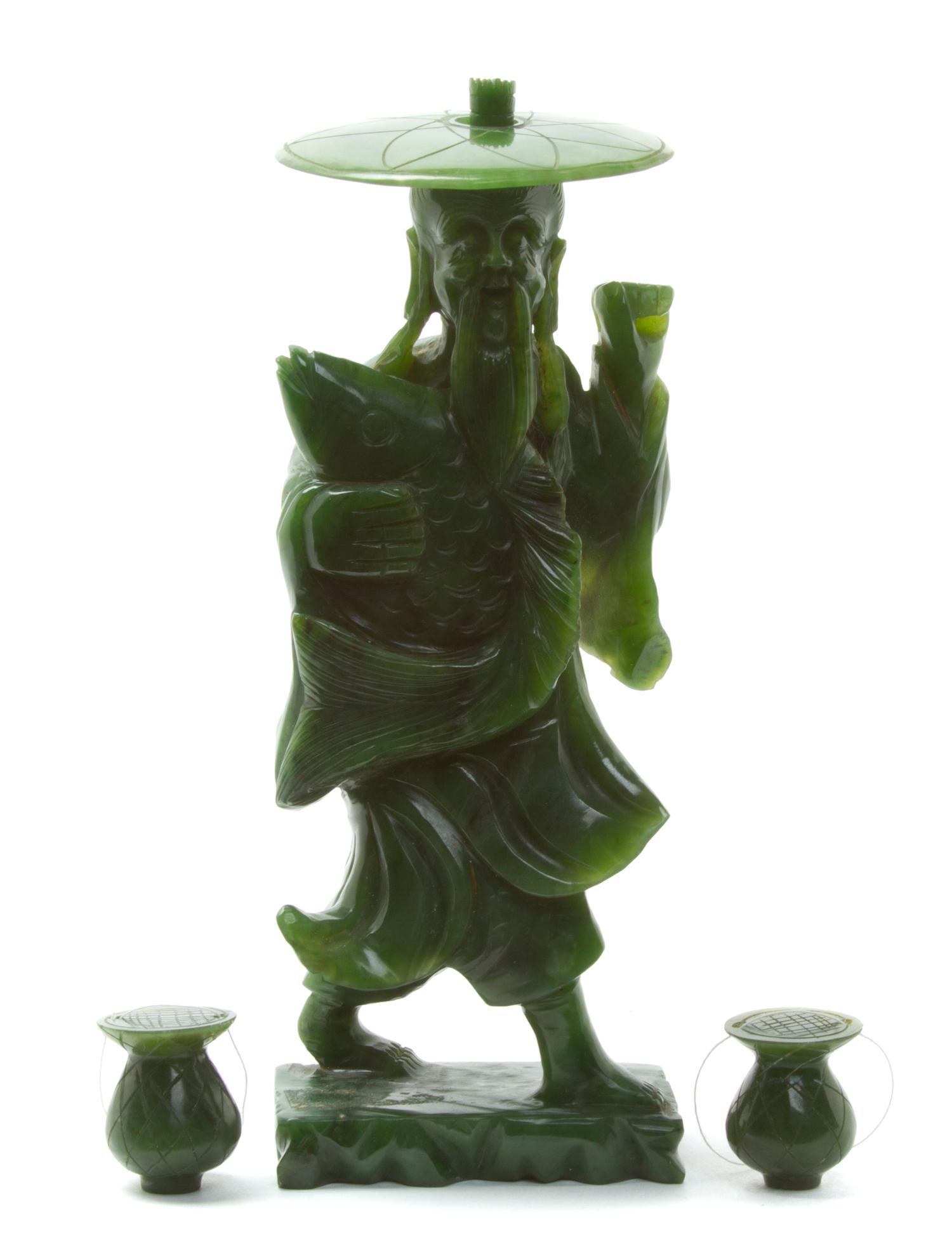 A Carved Hardstone Figure of a Fisherman Height 7 1/4 inches.