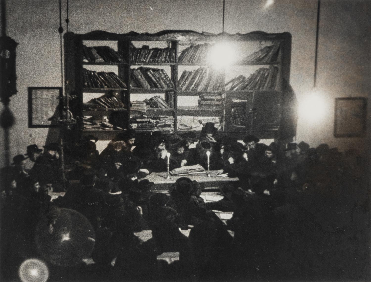 Roman Vishniac (1897-1990) Munkatch, Baruch Rabinovitch examining the Yeshiva, 1938
